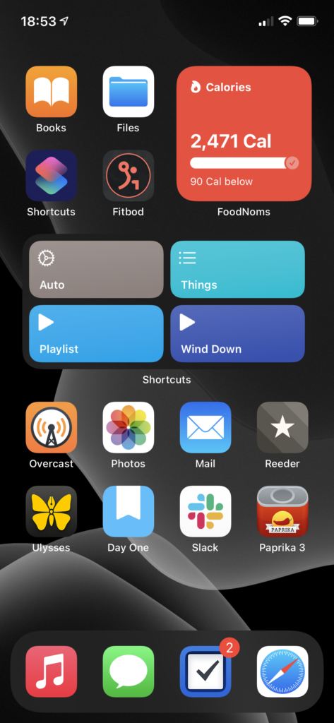 Screenshot of an iPhone home screen, with a mix of widgets and applications.